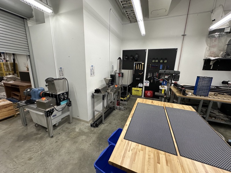 The Level 7 lab on the University of Alberta campus, 2023, with the shredder, extruder, and injection moulder installed.