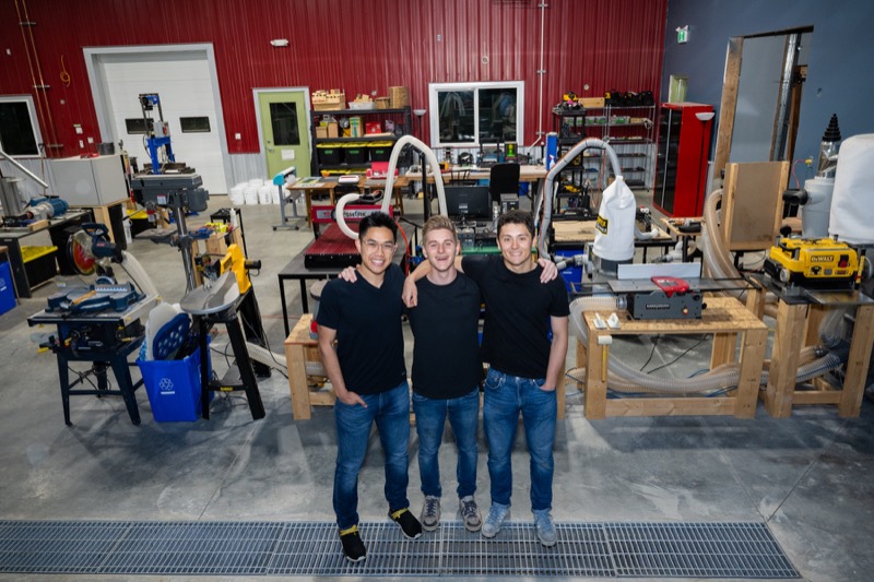The Level 7 founders in the shop, 2022