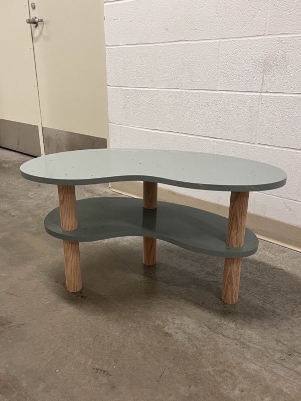 The Bean Table: two tiers of pressed recycled HDPE on wooden legs.