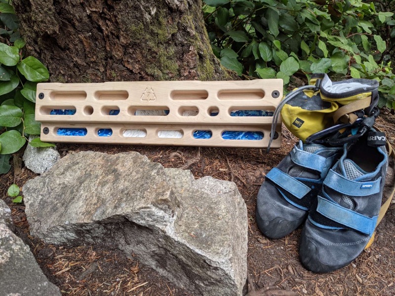 Another view of the hangboard: a wooden face over a pressed recycled-HDPE backing.
