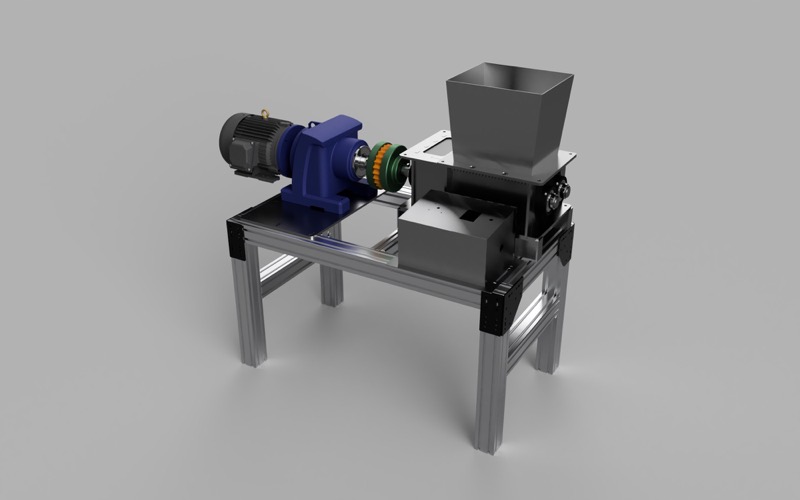 Render of the Fusion 360 master assembly: aluminium-extrusion table, motor and reducer on the riser, jaw coupling, shredder box, hopper, and electronics box.